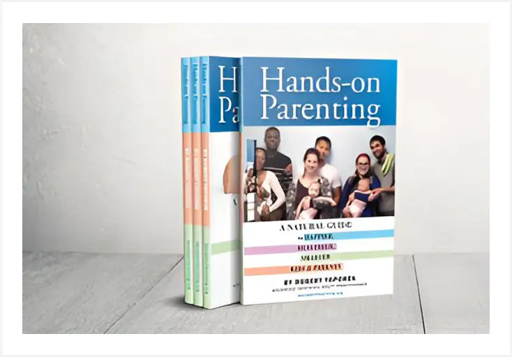 Three copies of the book titled "Hands-on Parenting: A Manual Guide to Repair, Equip, Bolster and Inspire" by Margaret Kennedy are on a surface. The cover features diverse families with young children.